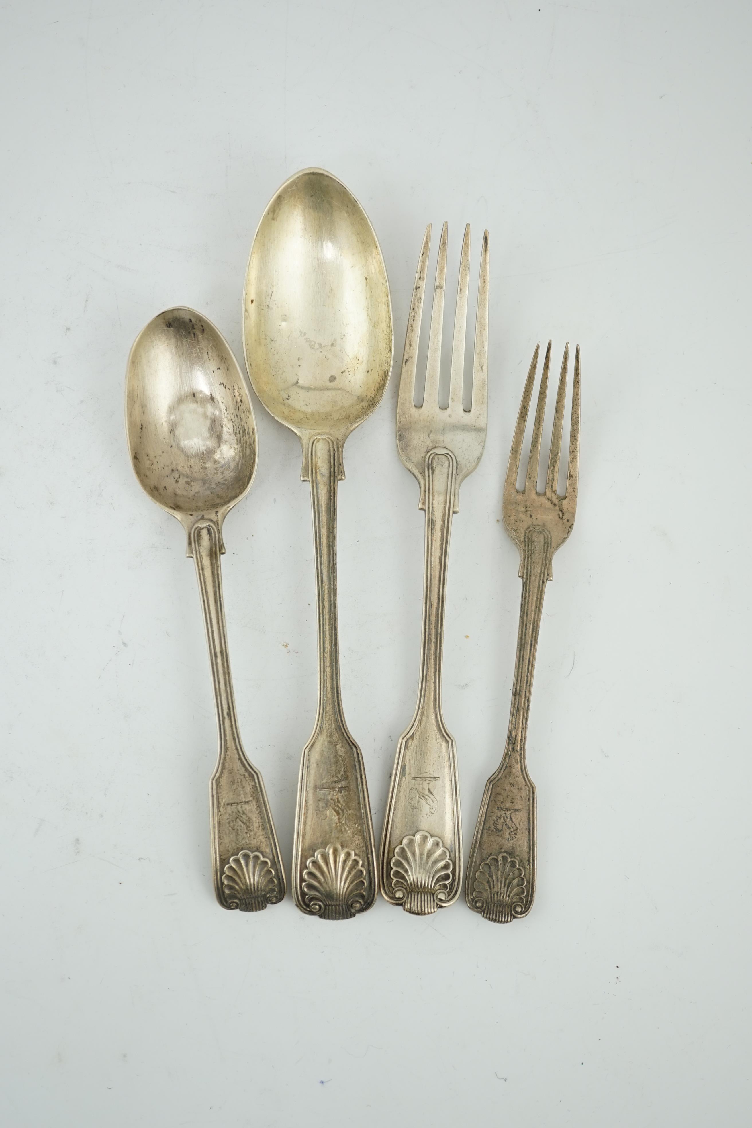 A part canteen of Victorian silver fiddle, thread and shell pattern flatware by George Adams